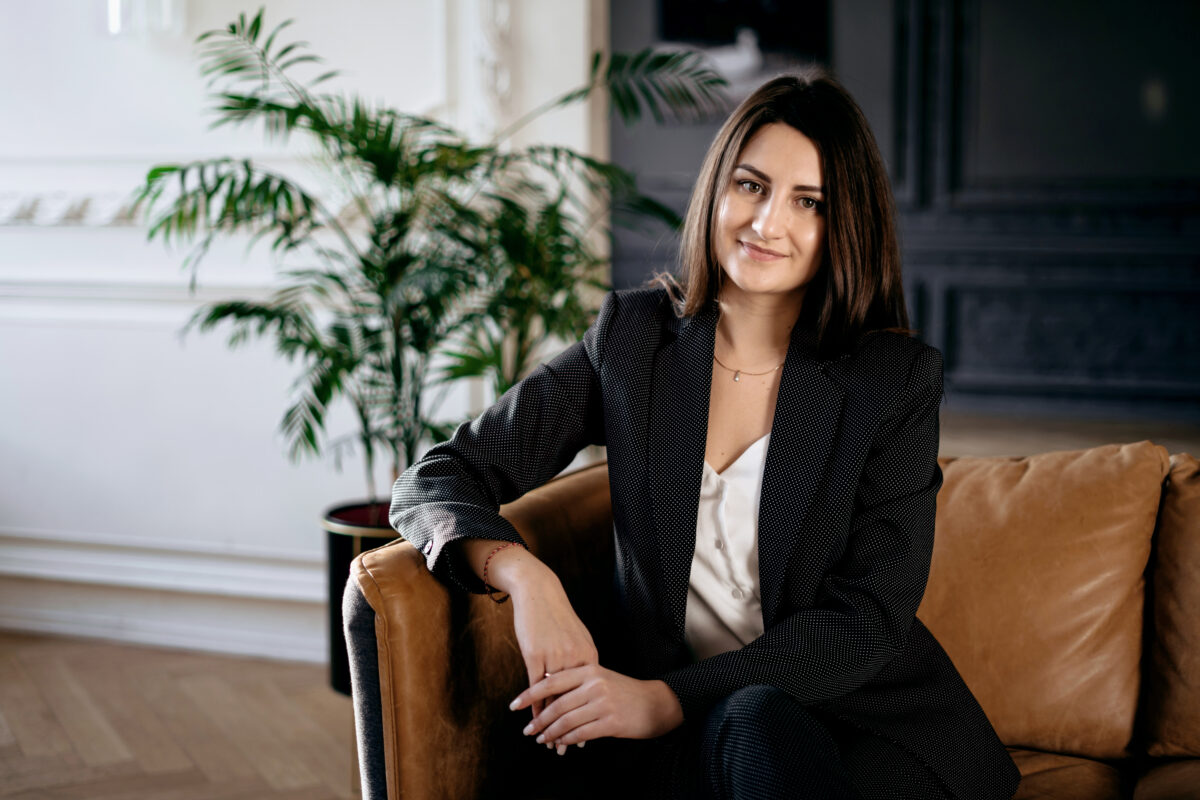 woman in executive role sitting on lounge in office